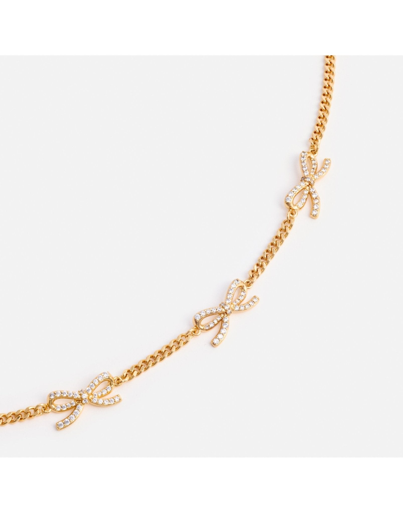 Young Ideas/Henmores - Crystal Bow Necklace - Gold - OS